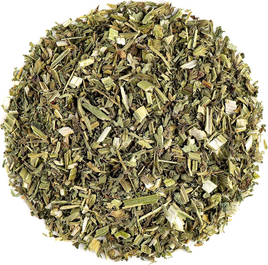 Dried herbs piled in a circular mound on a white background.