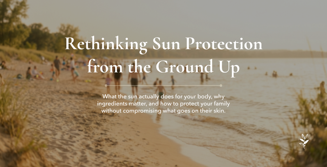 Families and children playing on a sandy beach at golden hour sunset, soft dreamy bokeh background, hero image for Juniper Apothecary's guide to natural mineral sun protection and ingredient safety